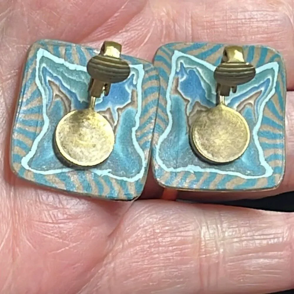 Vintage metal enamel clip style earrings.